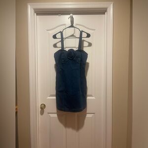 And Anthropologie size medium denim dress.